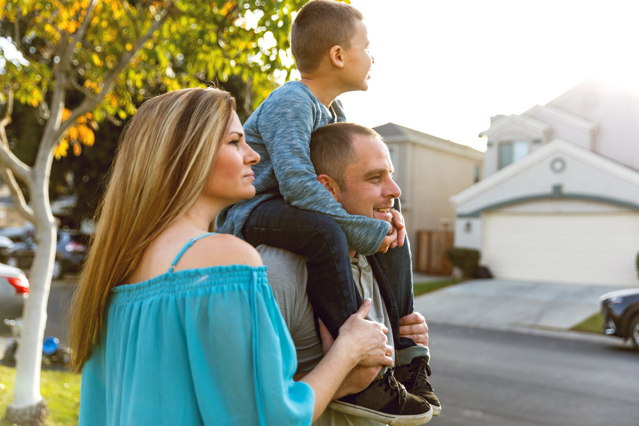 American family enjoying time together outside their home