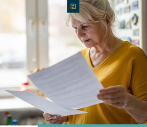 woman holding paperwork