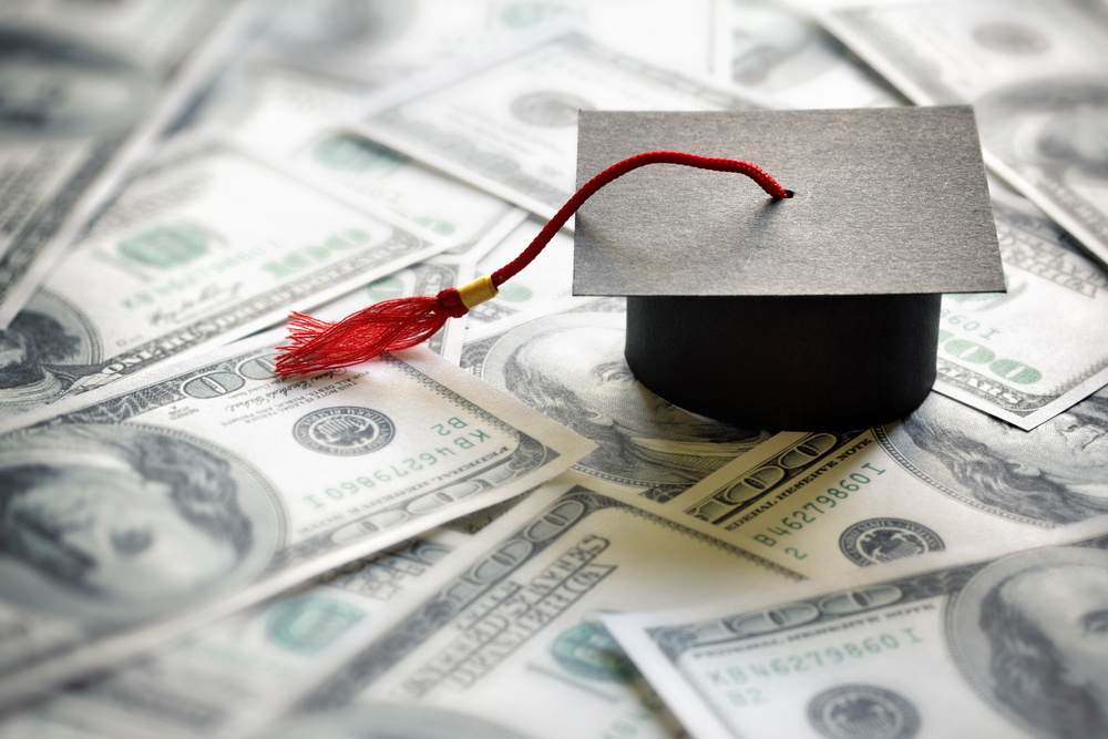 image of educational payment with graduation cap new money
