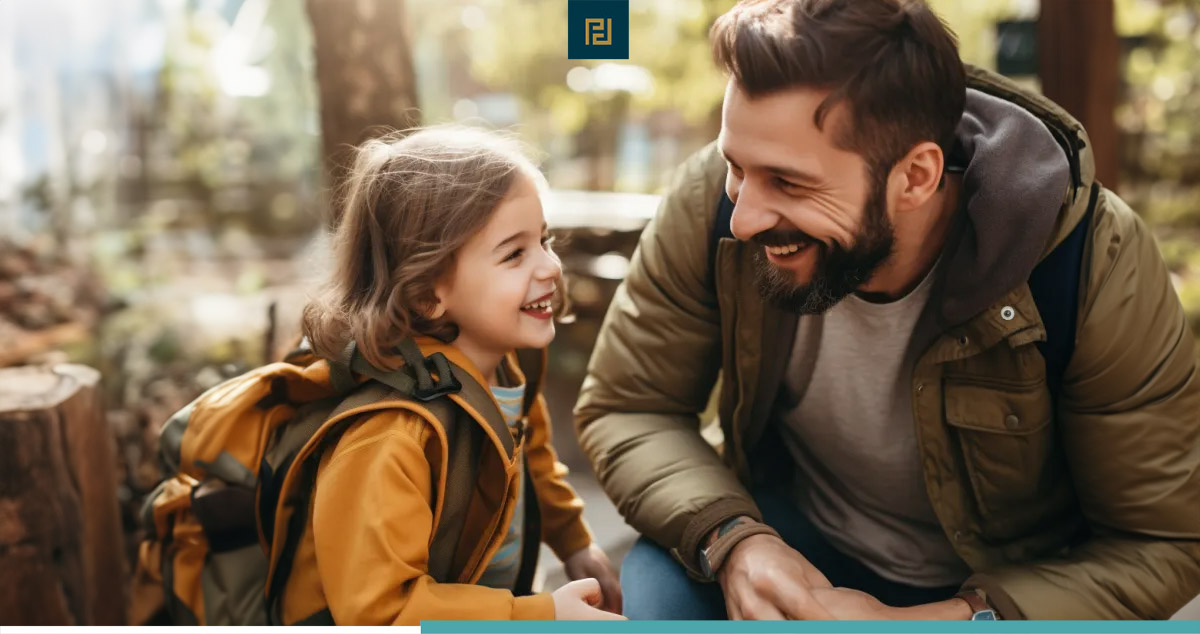 An image of a man and a child smiling, representing the joy shared by a father in Maryland who has parenting time with his child.