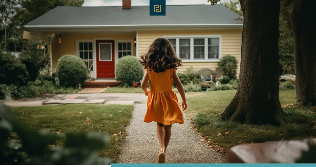 young girl running toward home