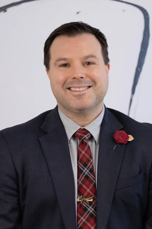 Headshot of Taylor D. Mackintosh