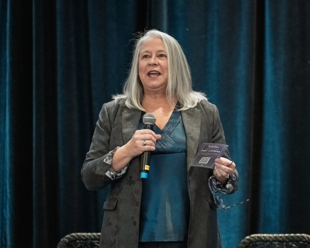 Leanne Cooper Speaking at firm event